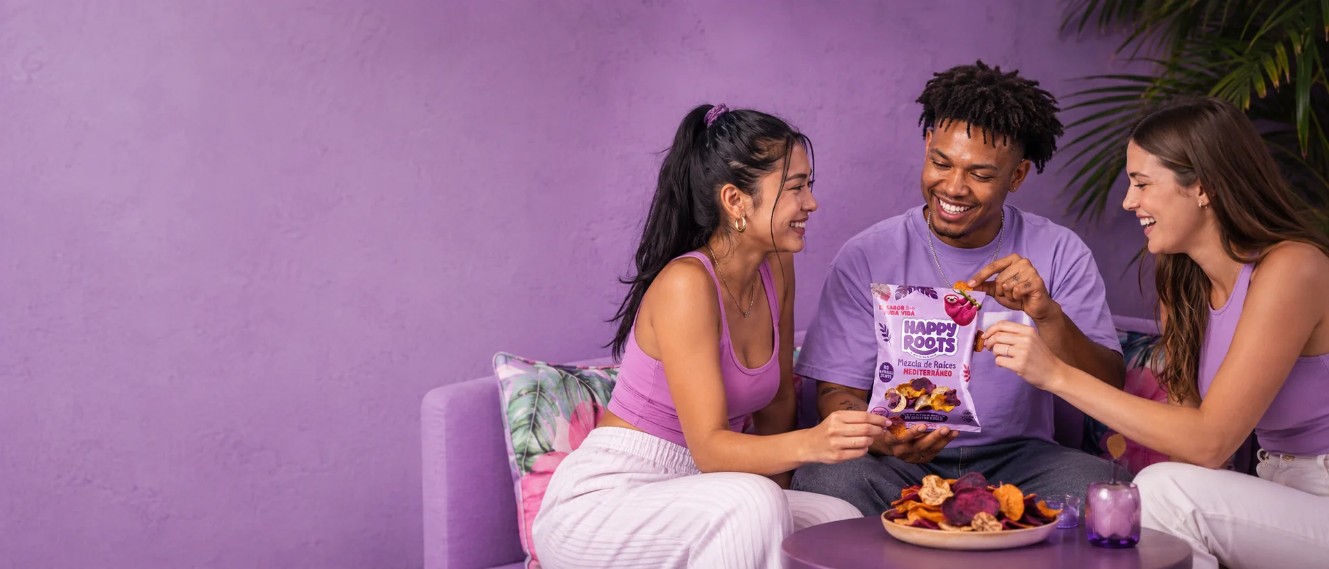 Friends sharing Happy Roots Mixed Roots chips